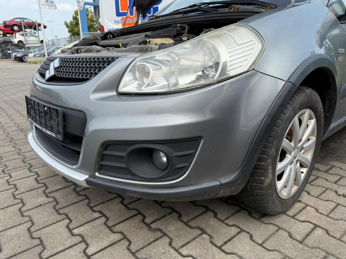 Suzuki SX4 EY original Stoßstange Stoßfänger vorn ZCD Galactic Grey Facelift BJ11